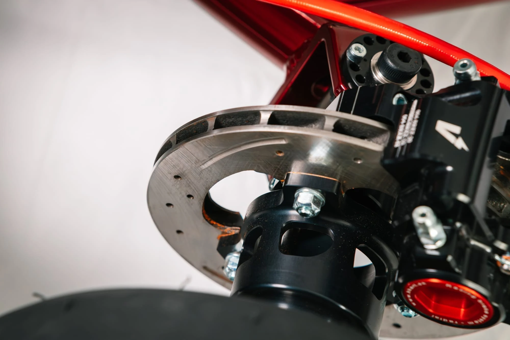 Front brake disc and caliper