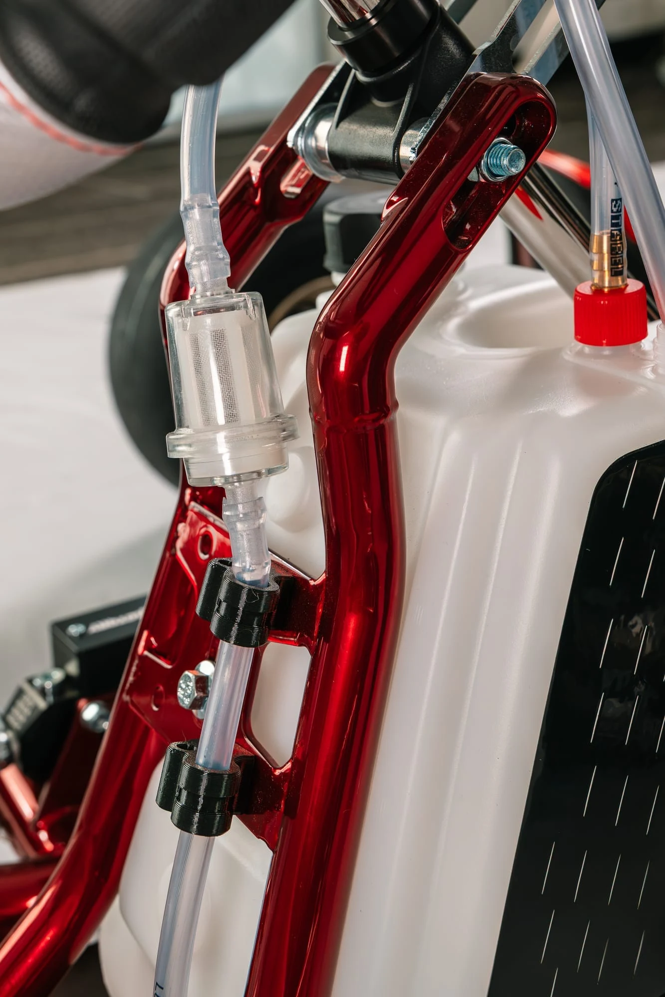 Fuel filter and lines on the red chrome frame