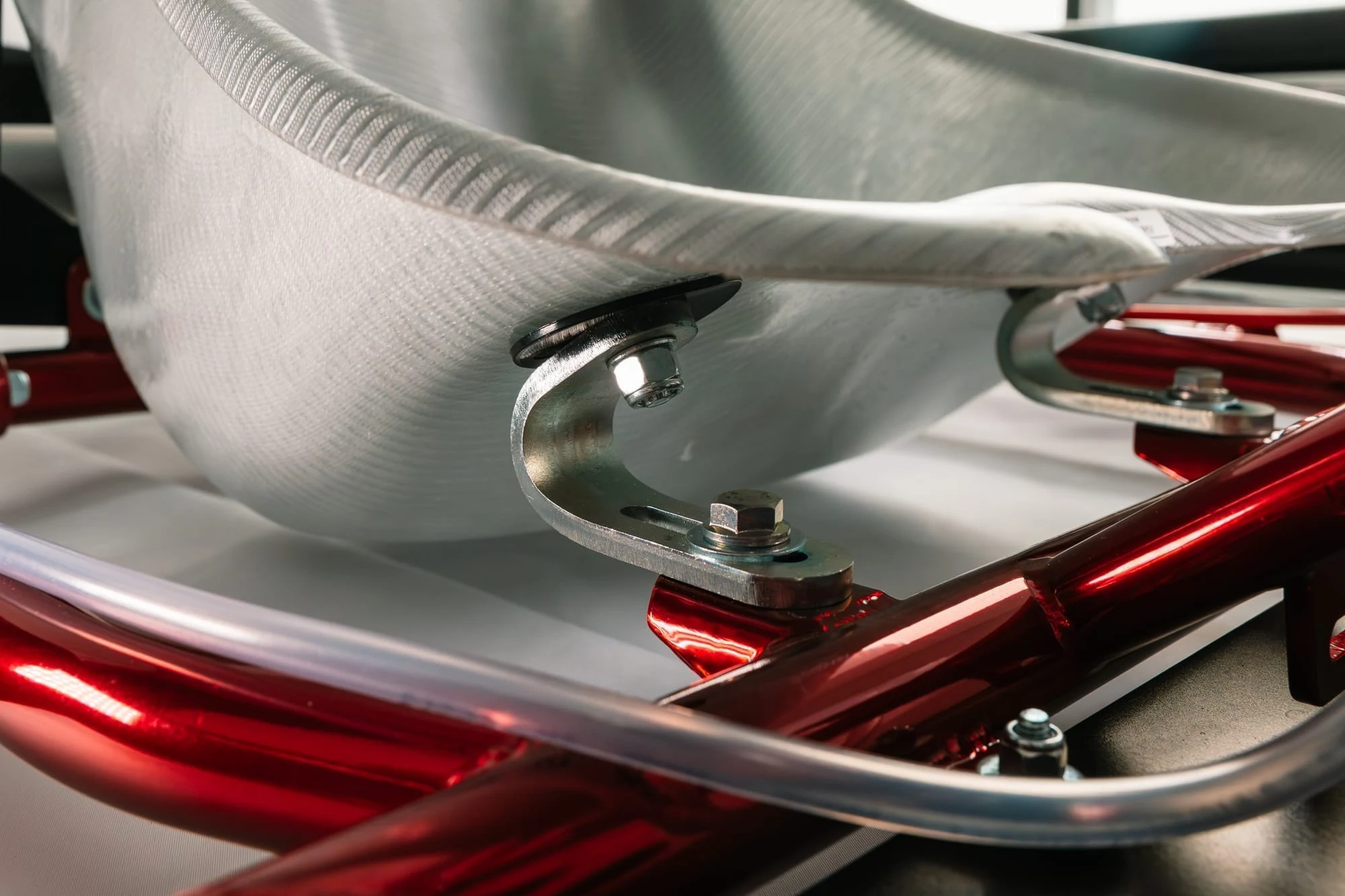 Seat mount on the red chrome frame