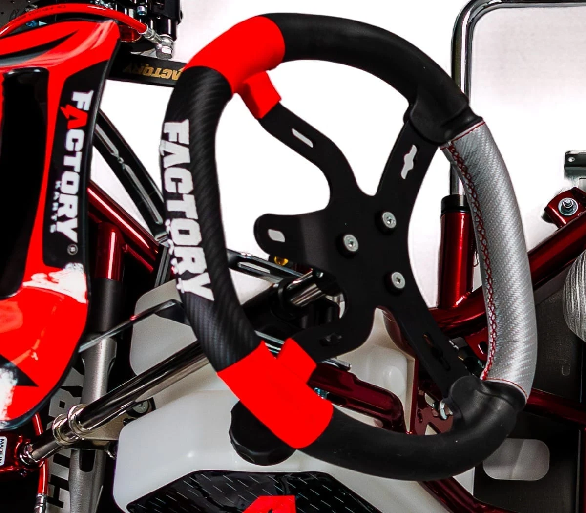 Steering wheel with Factory Karts branding