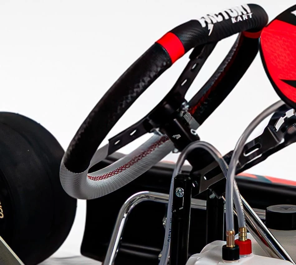 Steering wheel with Factory Karts branding